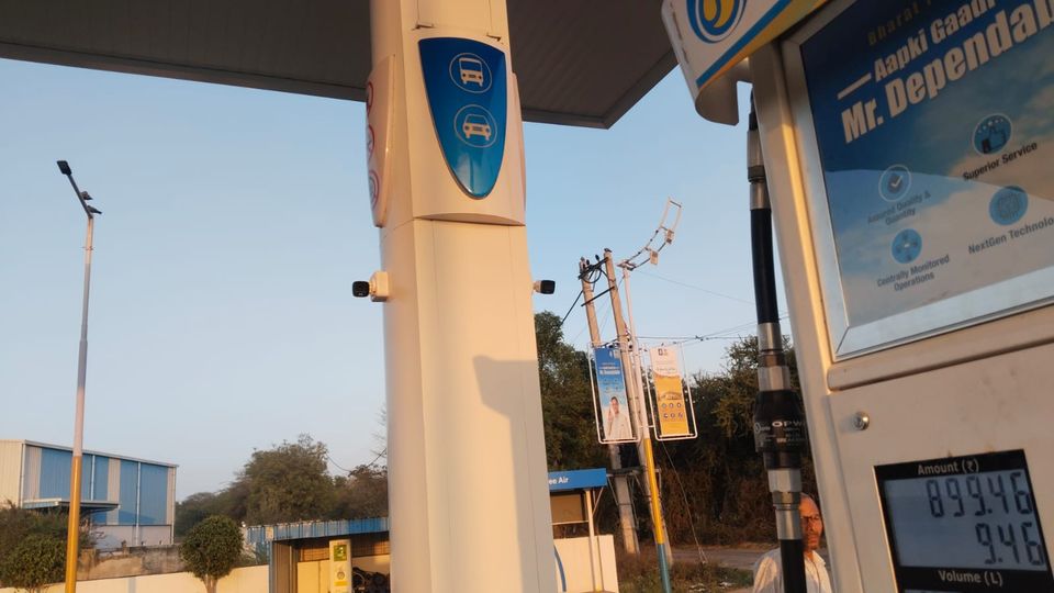 CCTV cameras installed on a canopy pillar at a fuel station forecourt