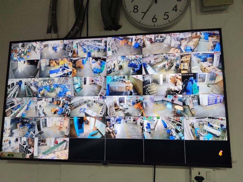 NVR monitoring wall showing factory floor camera feeds